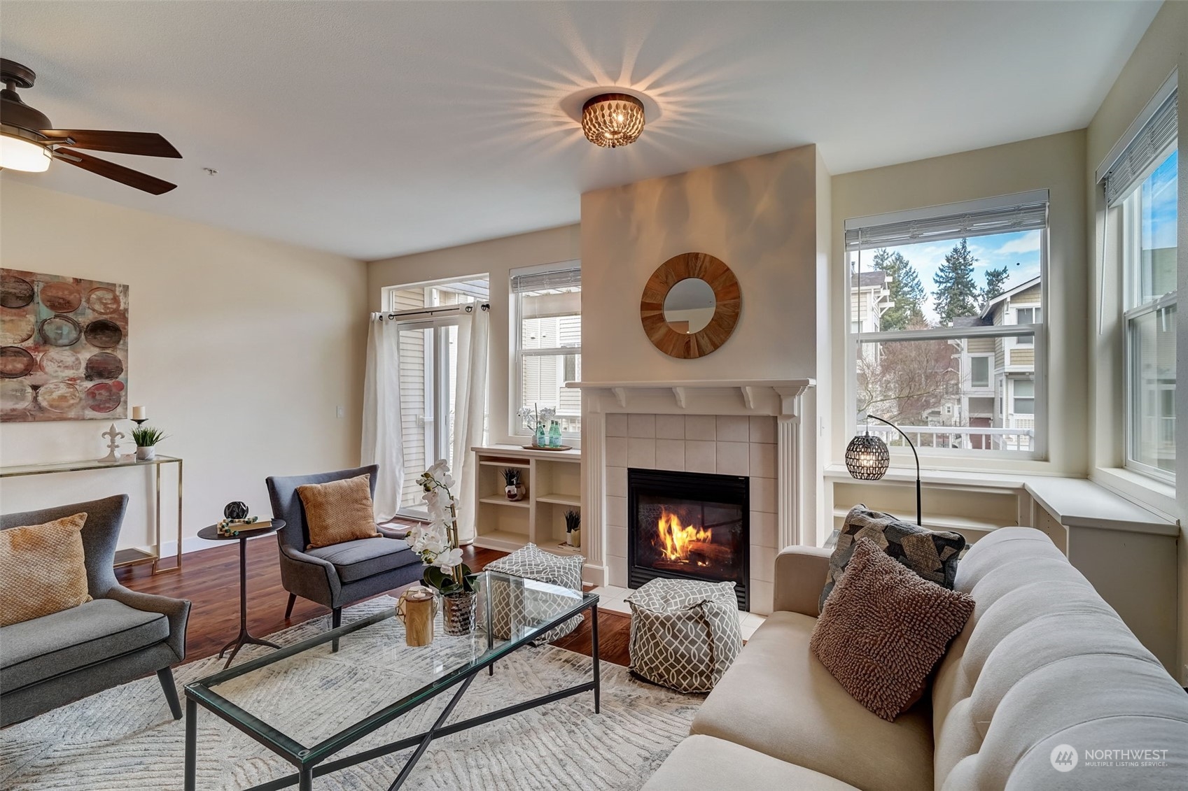 11873 Northeast 162nd Lane, Unit 121 Bothell, WA 98011 - Photo 2 of 32 a living room with furniture and a fireplace