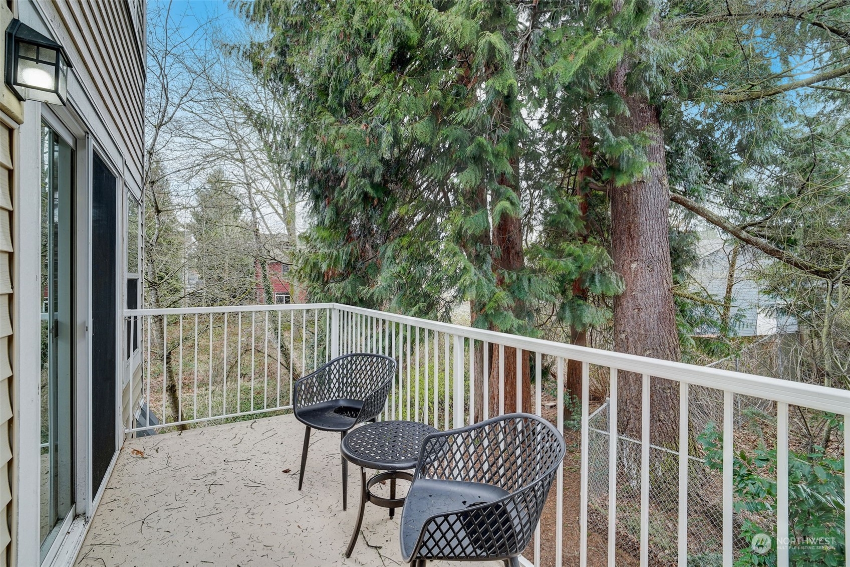 11873 Northeast 162nd Lane, Unit 121 Bothell, WA 98011 - Photo 29 of 32 a view of a chair in a balcony
