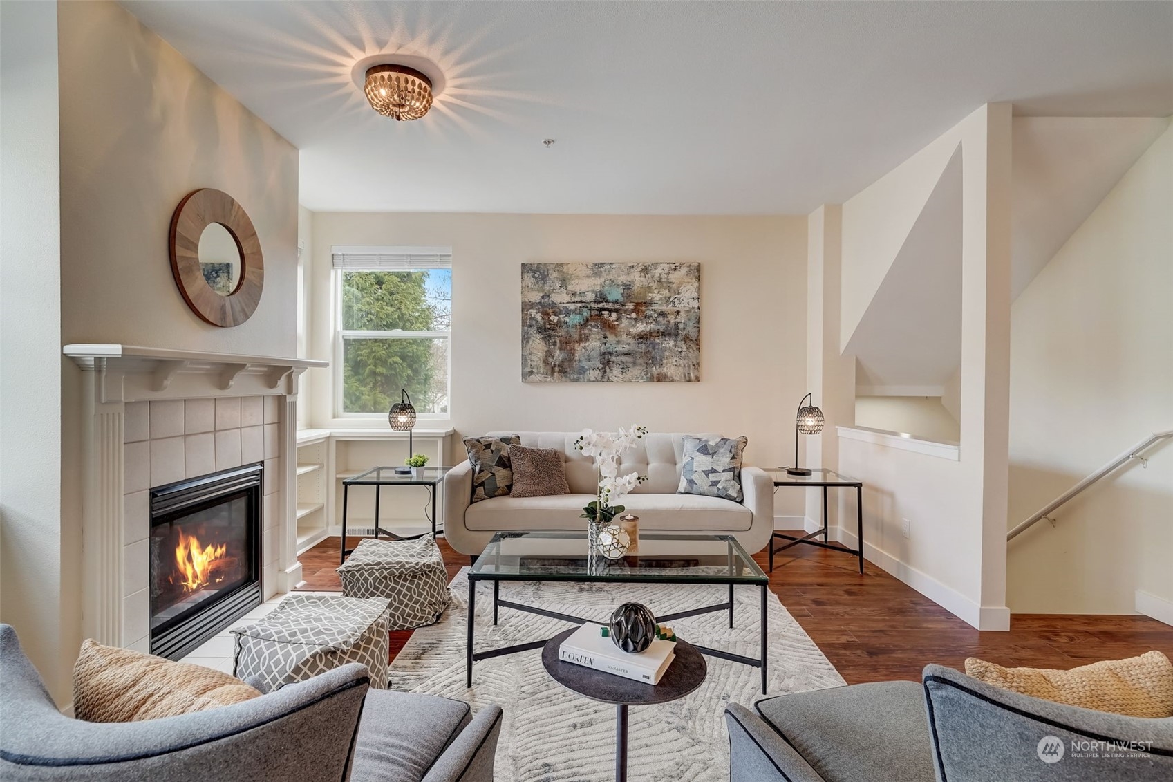 11873 Northeast 162nd Lane, Unit 121 Bothell, WA 98011 - Photo 3 of 32 a living room with furniture and a fireplace