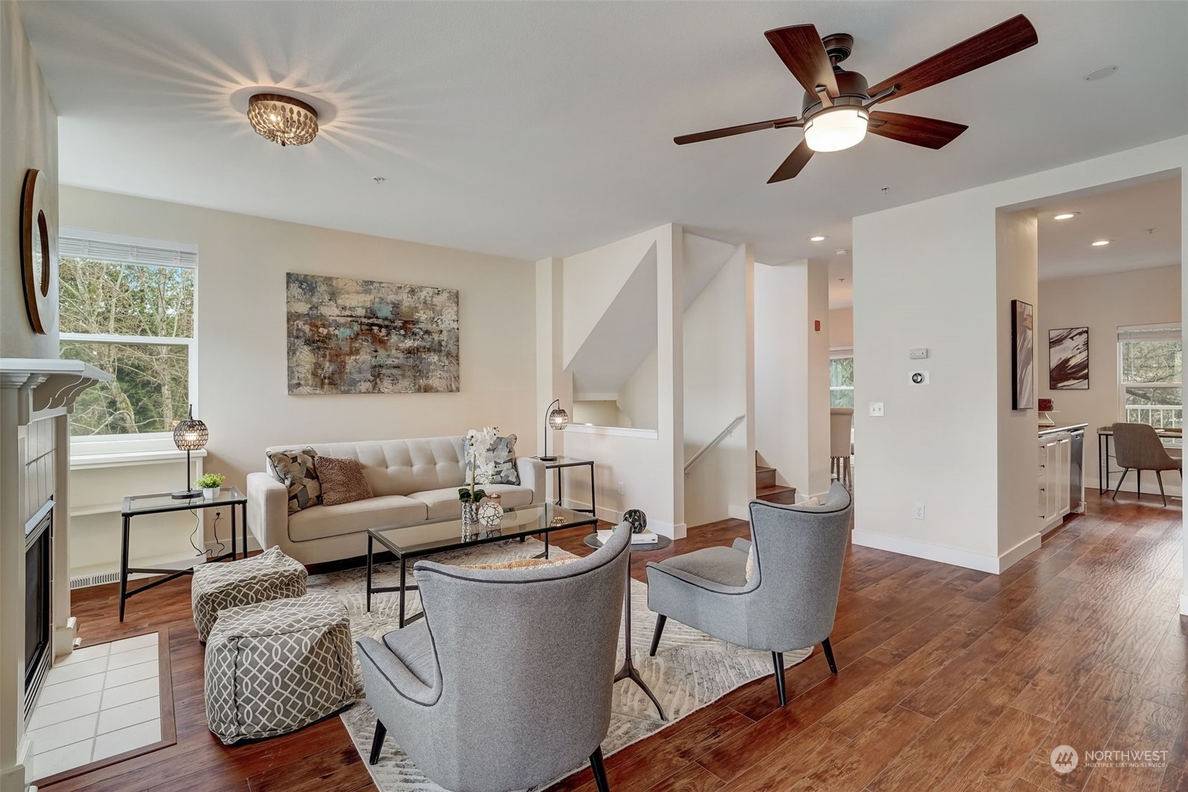 11873 Northeast 162nd Lane, Unit 121 Bothell, WA 98011 - Photo 4 of 32 a living room with furniture and a wooden floor
