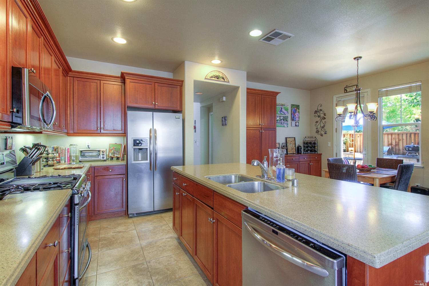 2193 Linwood Avenue Santa Rosa, CA 95404 - Photo 1 of 1 a kitchen with stainless steel appliances granite countertop a sink stove and refrigerator
