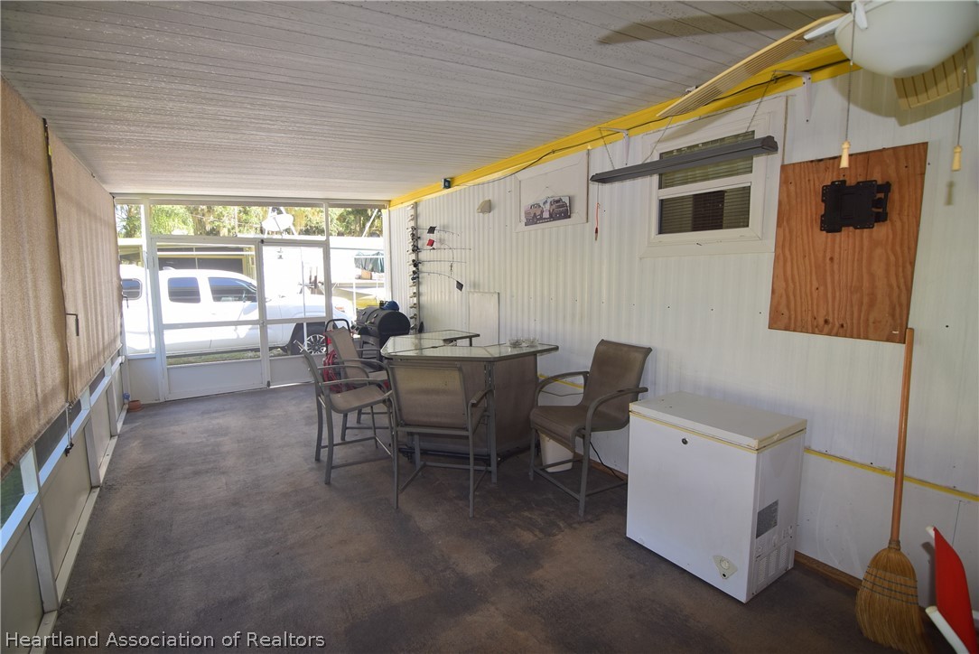 14 Henderson Road Lake Placid, FL 33852 - Photo 10 of 28 a view of a dining room with furniture window and outside view