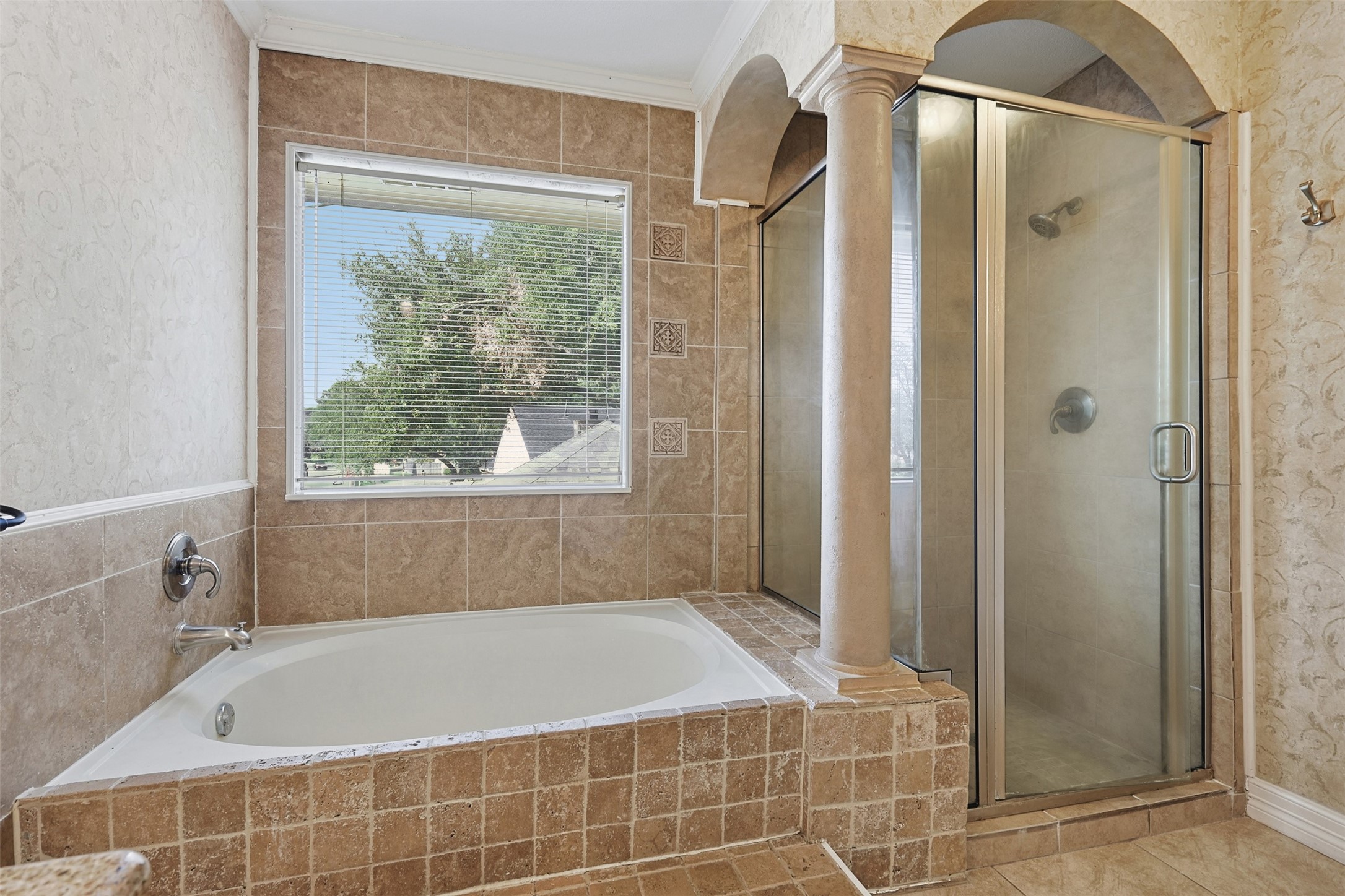9414 Calwood Circle Spring, TX 77379 - Photo 17 of 17 a bathroom with a bathtub and shower