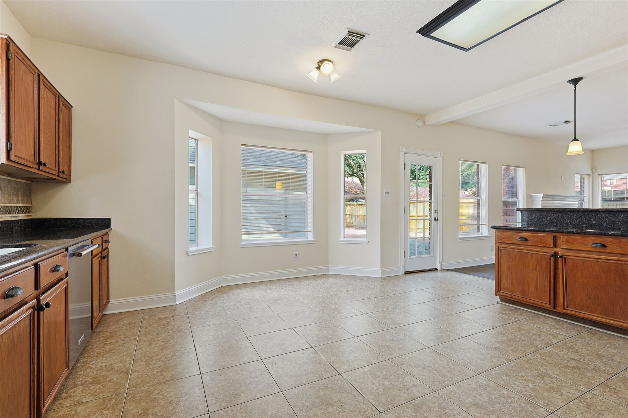 9414 Calwood Circle Spring, TX 77379 - Photo 7 of 17 a view of a kitchen with a sink cabinets and a kitchen