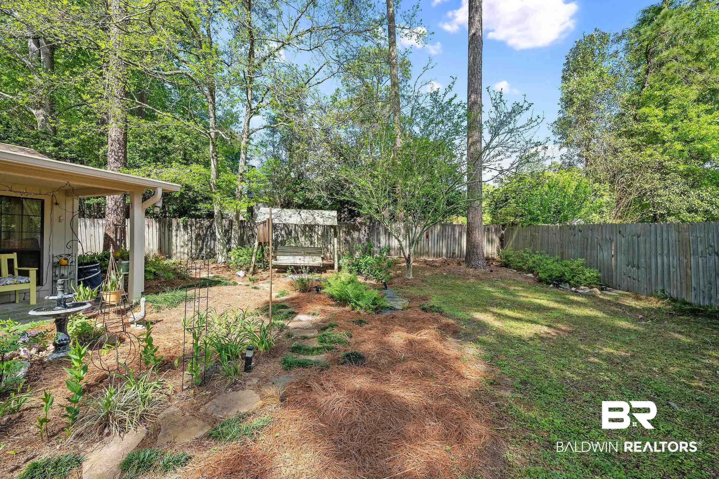 4026 Kingsrow Row Mobile, AL 36619 - Photo 44 of 51 Fenced backyard featuring a patio area