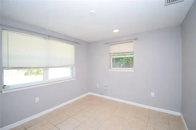 a view of an empty room with window