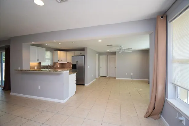 a view of a kitchen from the hallway