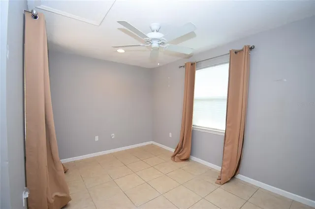 a view of a hallway with a washer and dryer
