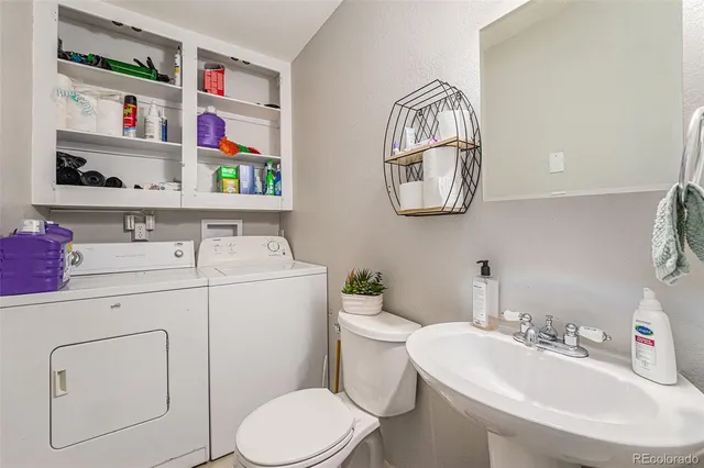 a bathroom with a sink and a toilet