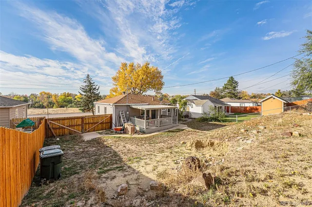 aerial view of a house with a yard