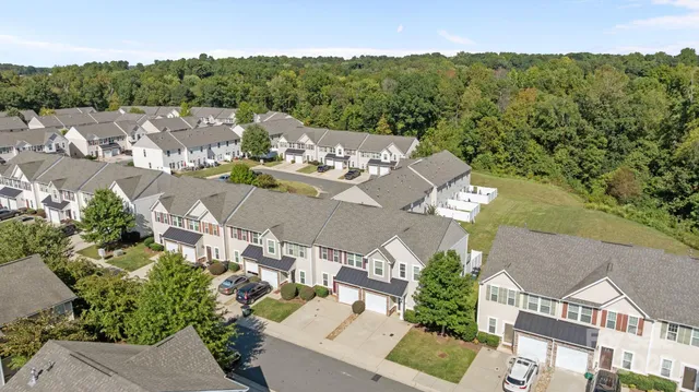 an aerial view of a house with a garden