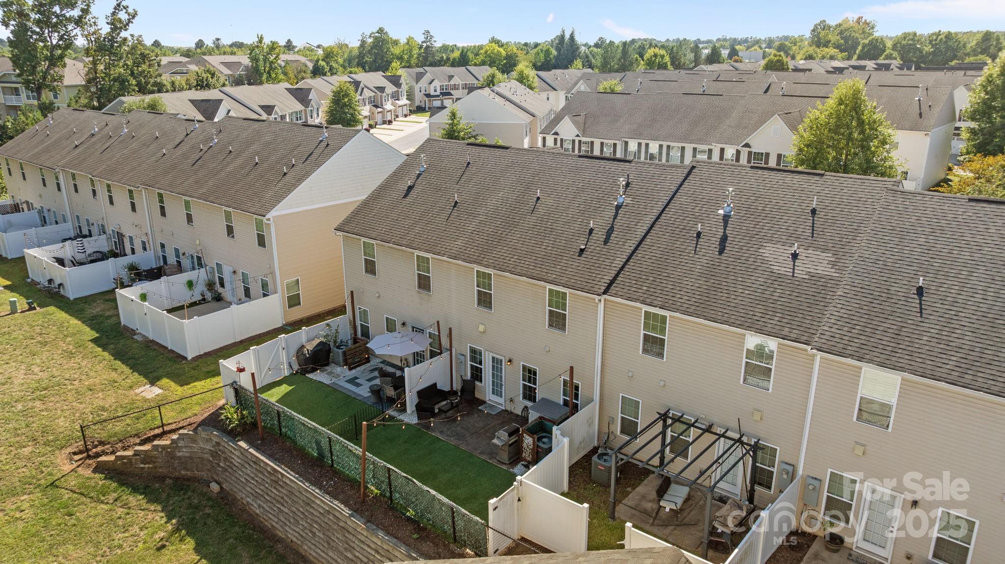7443 Red Mulberry Way Charlotte, NC 28273 - Photo 5 of 45 a view of a house with pool and chairs