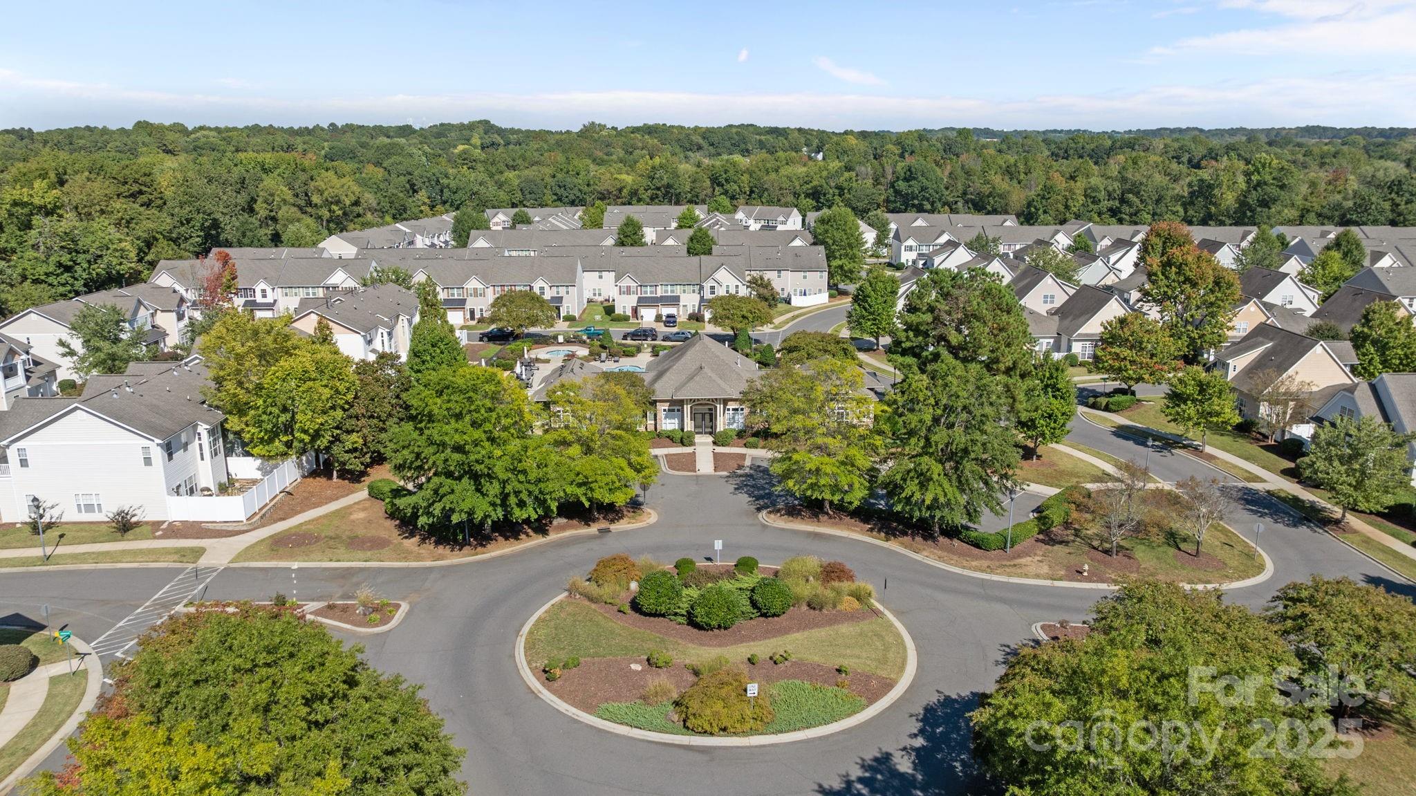 7443 Red Mulberry Way Charlotte, NC 28273 - Photo 8 of 45 an aerial view of a house with yard swimming pool and outdoor seating