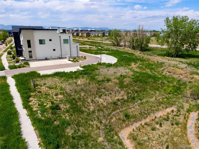 a view of a lake with a big yard