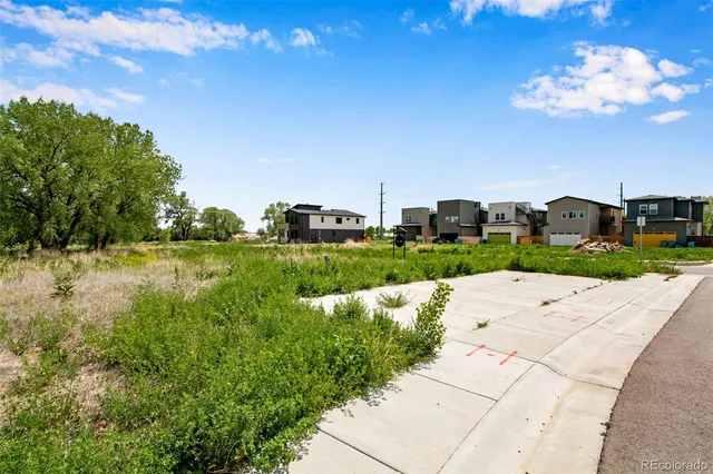 a view of a street with houses