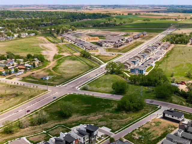 a view of a big yard with a fountain