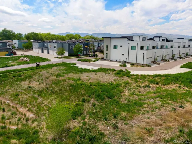 a view of a house with a big yard