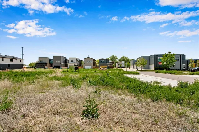 a view of a house with a big yard
