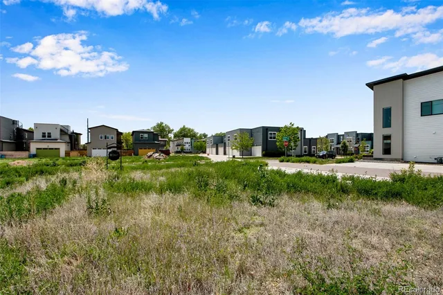 a view of a lake with a big yard