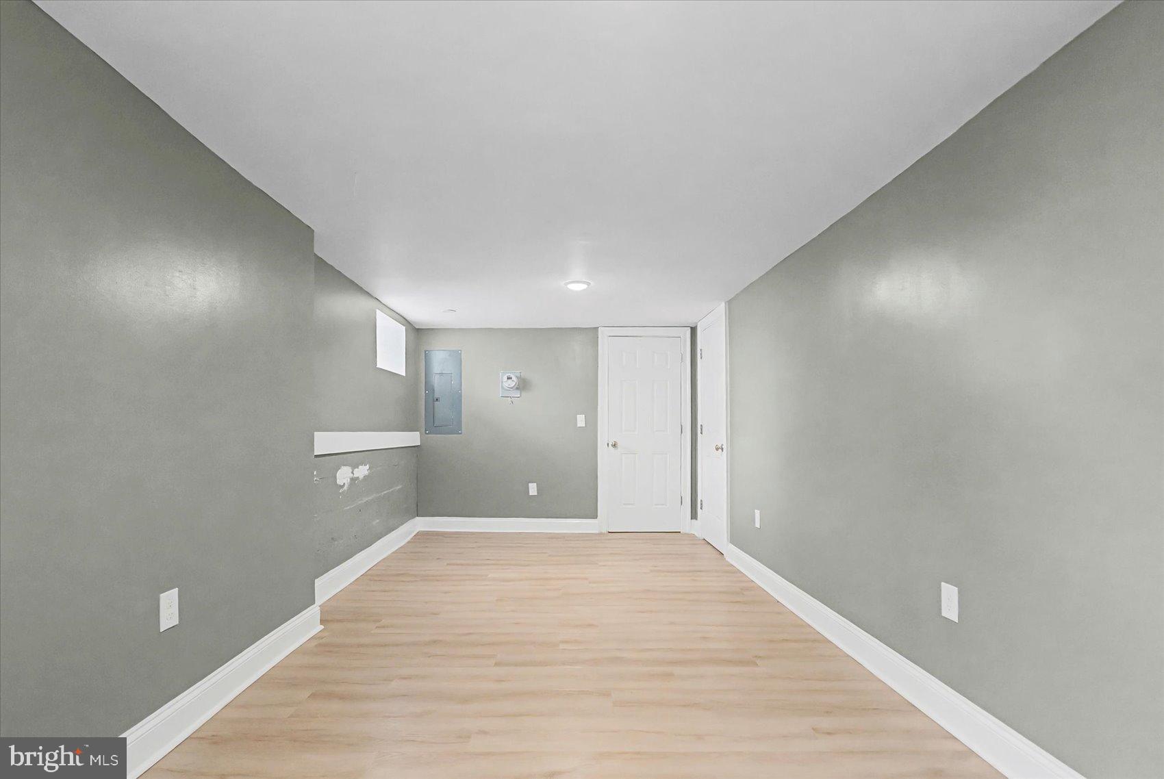200 Pinewood Road Dundalk, MD 21222 - Photo 24 of 39 a view of a big room with wooden floor and closet
