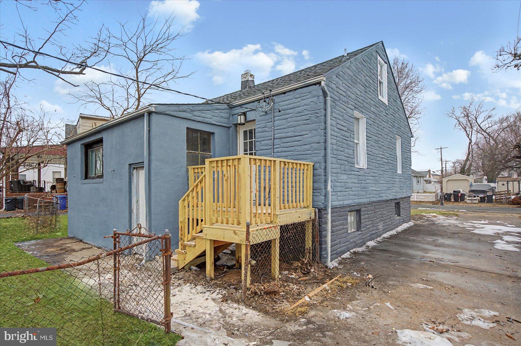 200 Pinewood Road Dundalk, MD 21222 - Photo 29 of 39 a view of a chair and table in backyard of the house