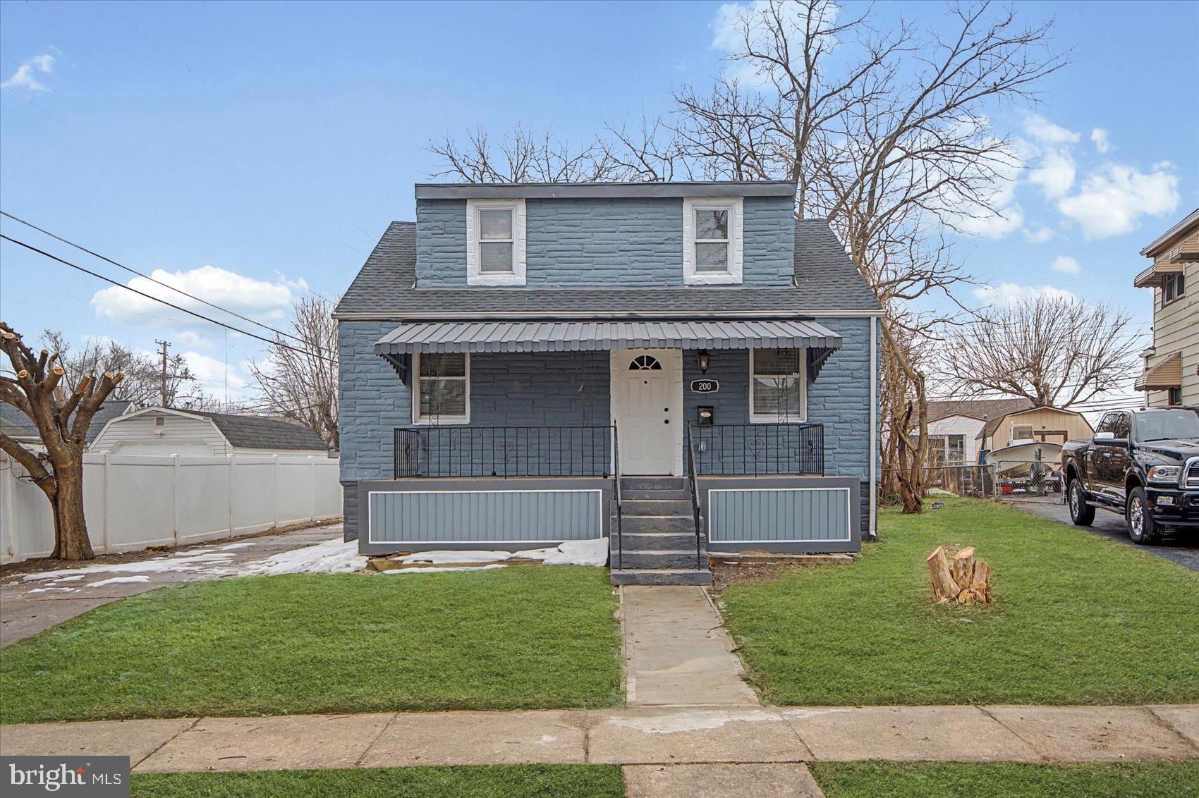200 Pinewood Road Dundalk, MD 21222 - Photo 35 of 39 a front view of a house with a yard