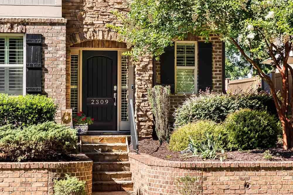 2309 Lowden Street Raleigh, NC 27608 - Photo 4 of 43 a front view of a house with outdoor space