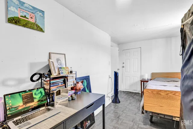 a view of a workspace with furniture and toys