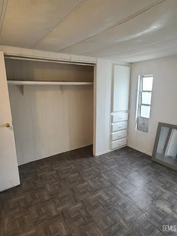 a view of empty room with front door