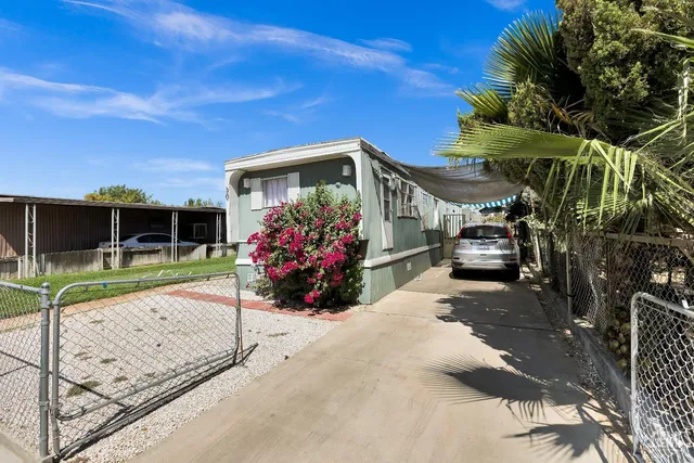 a view of a house with a patio