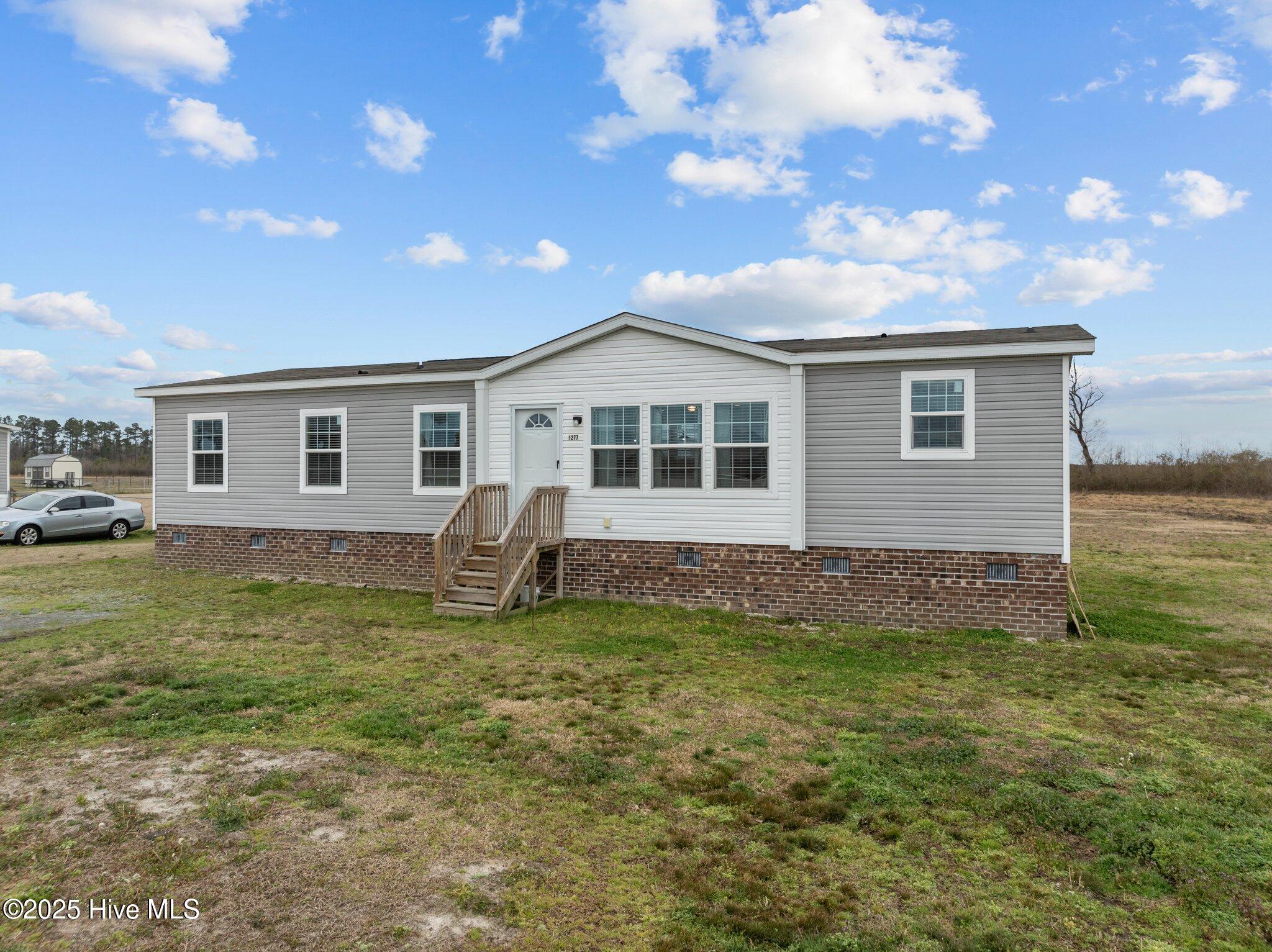 1277 Frederick Road Chocowinity, NC 27817 - Photo 2 of 48 2-web-or-mls-DJI_0658