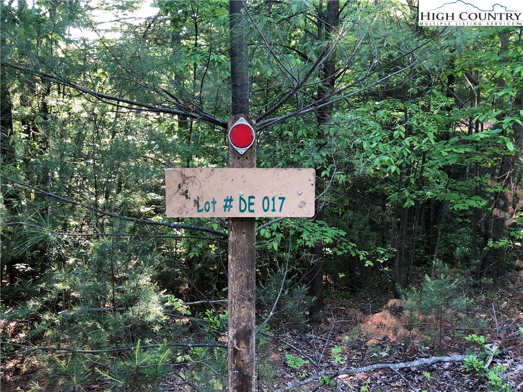 Lot 17 Wolf Pen Road Purlear, NC 28665 - Photo 3 of 25 a sign that is sitting on a tree
