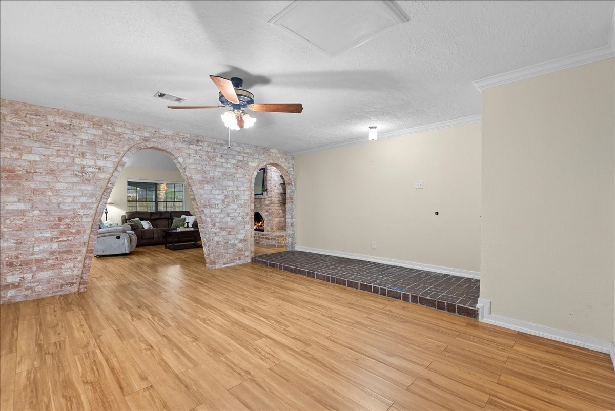3727 Rau Drive Dickinson, TX 77539 - Photo 13 of 45 a view of empty room with wooden floor