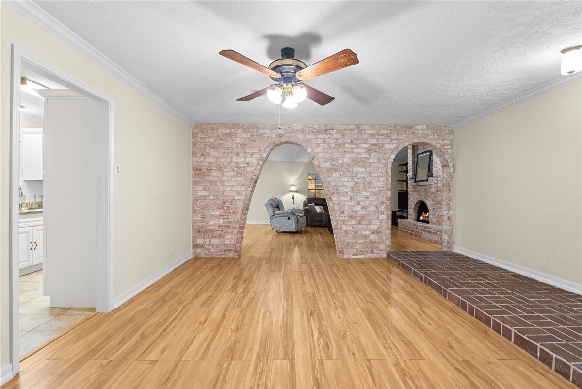 3727 Rau Drive Dickinson, TX 77539 - Photo 14 of 45 wooden floor in kitchen with a window