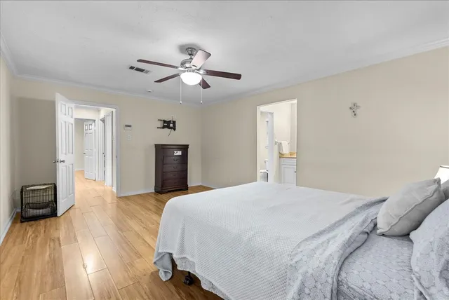 a bathroom with a granite countertop sink mirror toilet and shower