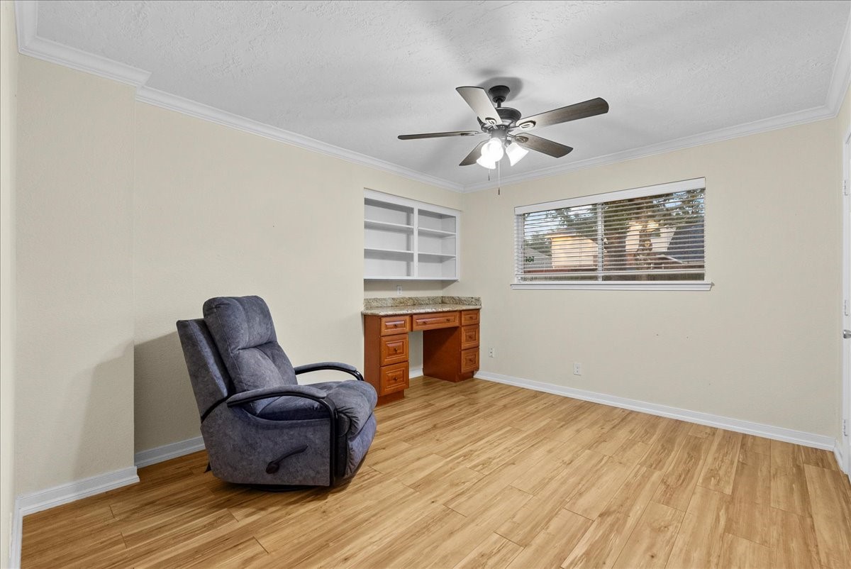 3727 Rau Drive Dickinson, TX 77539 - Photo 36 of 45 a living room with furniture and a wooden floor