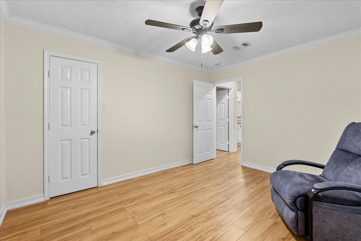 3727 Rau Drive Dickinson, TX 77539 - Photo 37 of 45 a view of an empty room with wooden floor