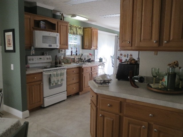 31 Coffeys Road Farmville, VA 23901 - Photo 7 of 15 a kitchen with a sink and cabinets