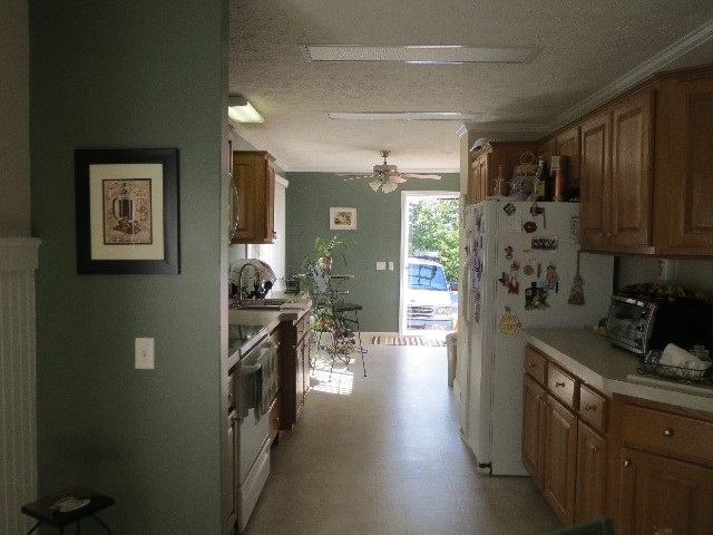 31 Coffeys Road Farmville, VA 23901 - Photo 8 of 15 a kitchen with granite countertop a refrigerator stove and sink