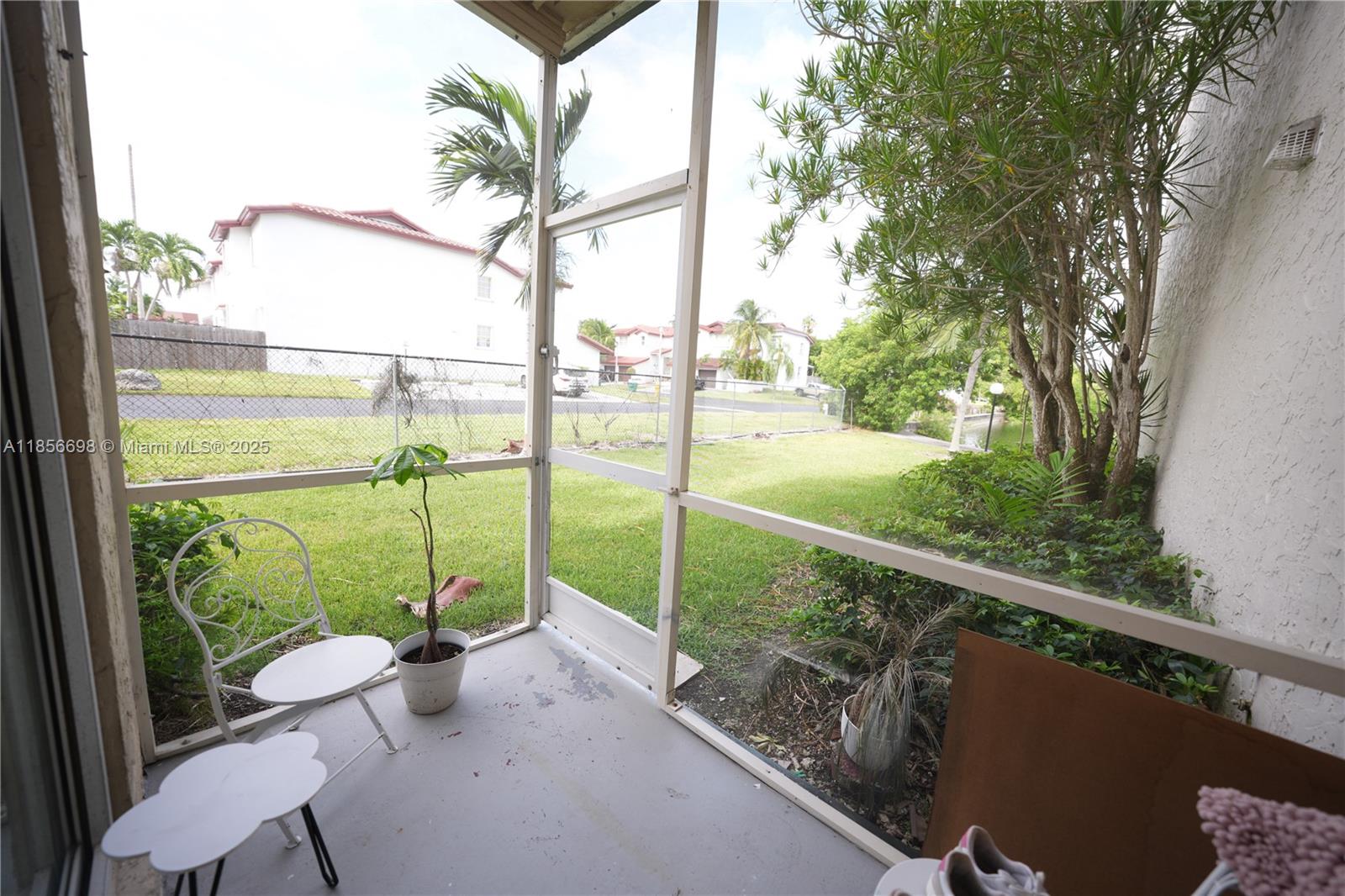 21121 Southwest 85th Avenue, Unit 117 Cutler Bay, FL 33189 - Photo 15 of 15 a view of a balcony with lake view