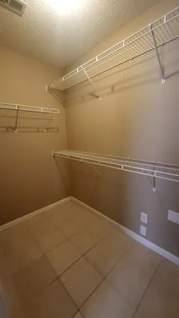 a view of a room with racks on the wall