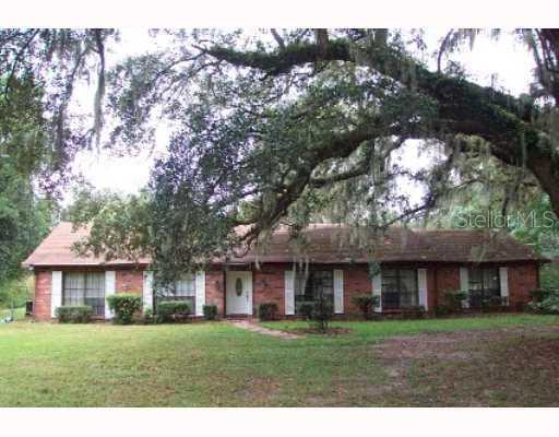 6320 Muck Pond Road Seffner, FL 33584 - Photo 1 of 1 Exterior Front - 76 ACRES WITH A SOLID, JERRY BUILT HOME! 15 ACRES UASEABLE, 61 ACRES LOW PASTURE LAND! GREAT LOCATION, WITH EASY ACCESS TO ORLANDO AND TAMPA!