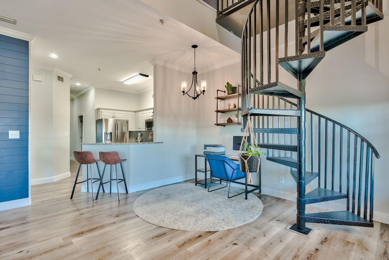 4507 Furling Lane, Unit 302 Destin, FL 32541 - Photo 2 of 15 a view of livingroom with furniture and workspace