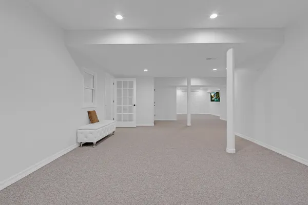 a view of work space with wooden floor and windows