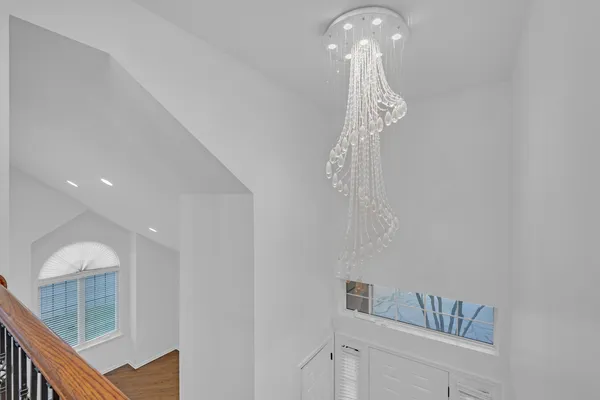 a bathroom with a light fixture and a sink