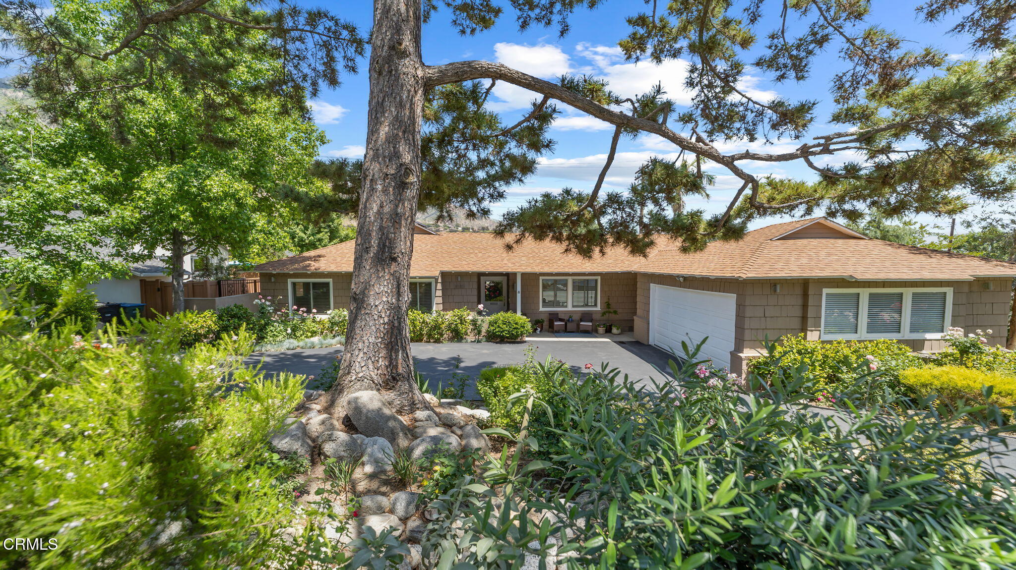2030 North Altadena Drive Pasadena, CA 91107 - Photo 1 of 61 a front view of a house with garden