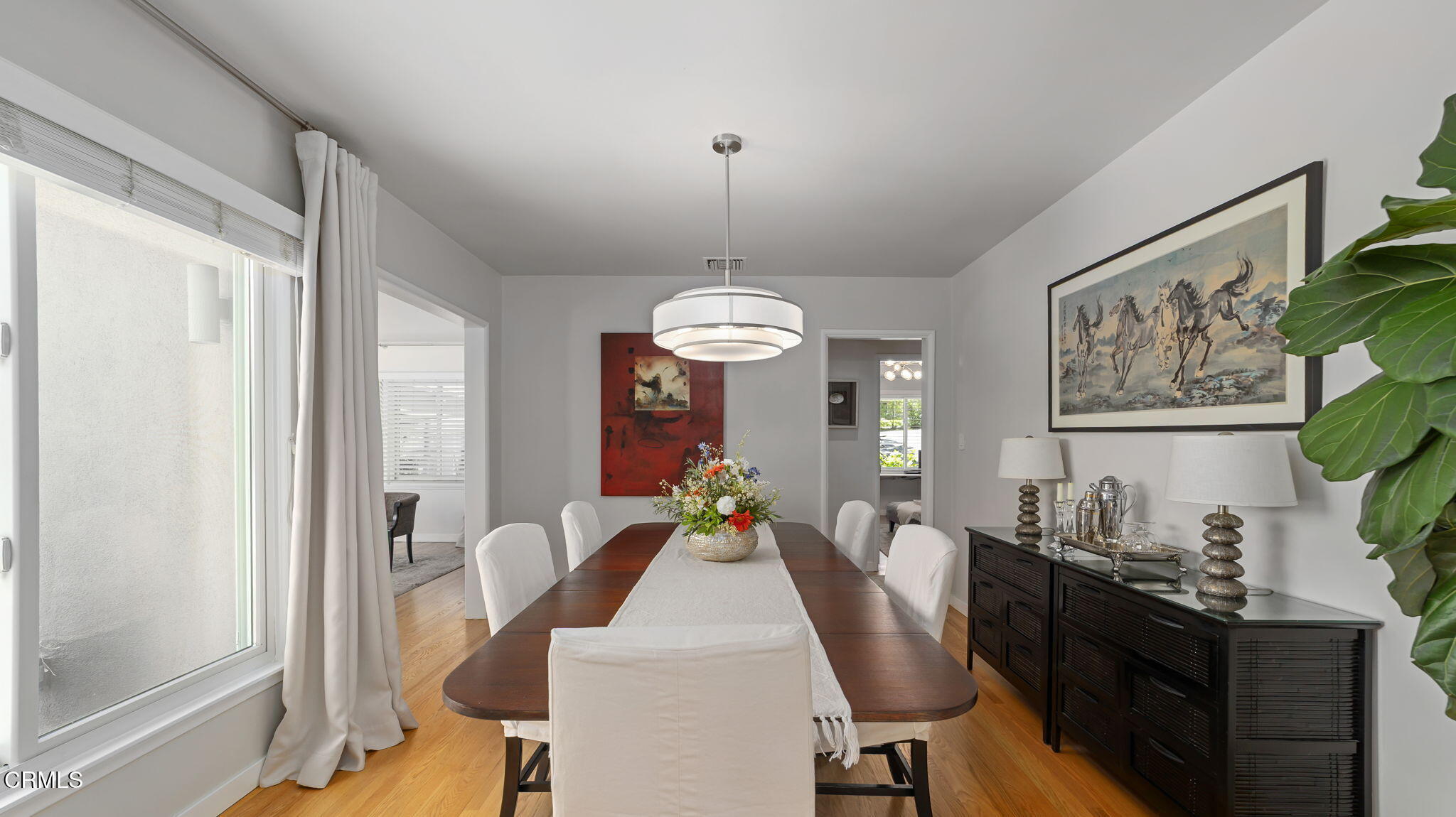 2030 North Altadena Drive Pasadena, CA 91107 - Photo 11 of 61 a dining room with furniture and chandelier