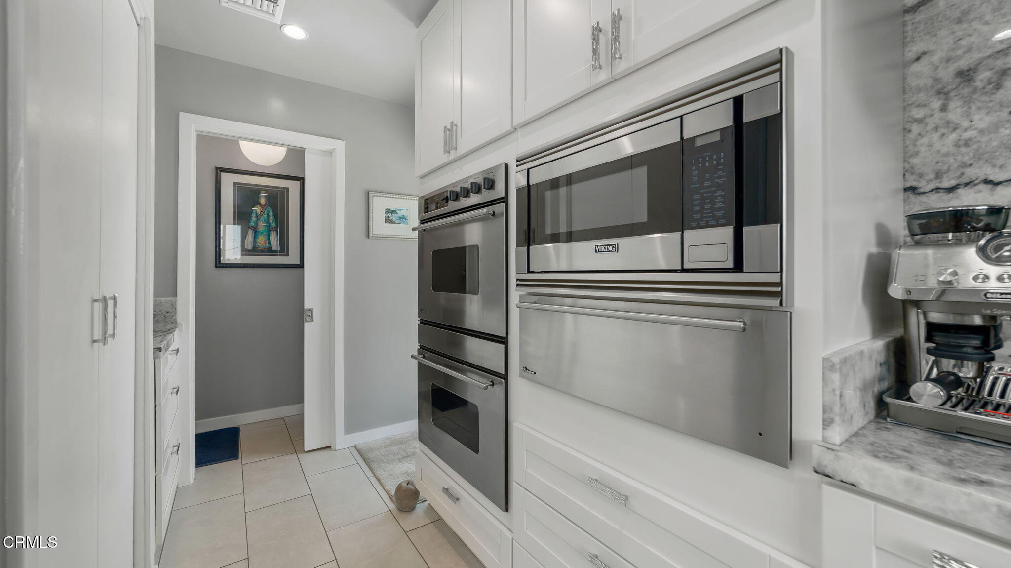 2030 North Altadena Drive Pasadena, CA 91107 - Photo 17 of 61 a kitchen with granite countertop a refrigerator and a stove