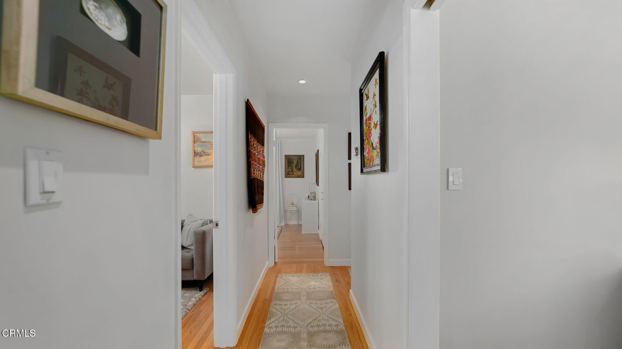2030 North Altadena Drive Pasadena, CA 91107 - Photo 20 of 61 a view of a hallway with wooden floor and a bathroom