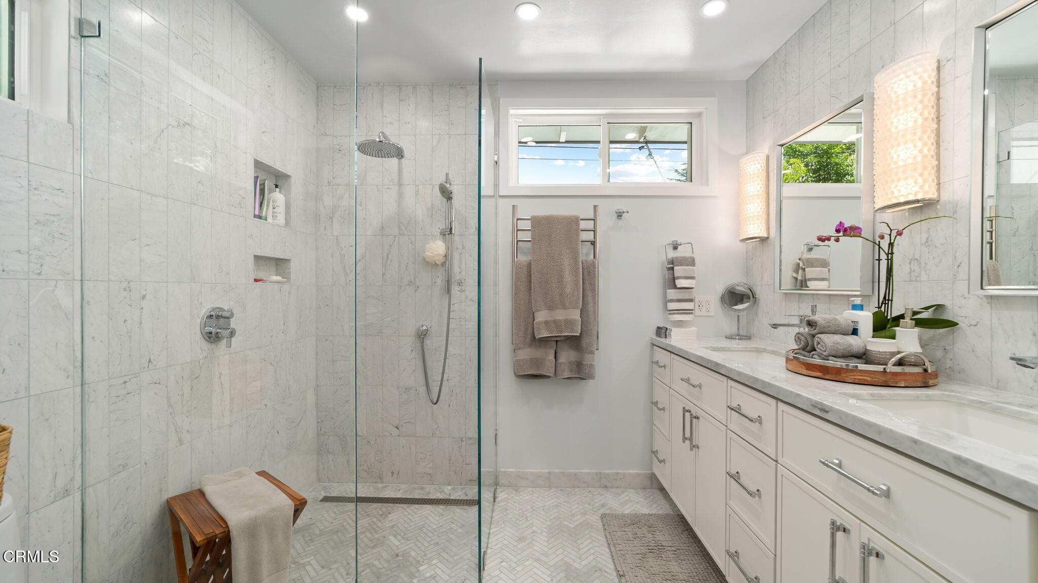 2030 North Altadena Drive Pasadena, CA 91107 - Photo 24 of 61 a spacious bathroom with a shower sink and mirror